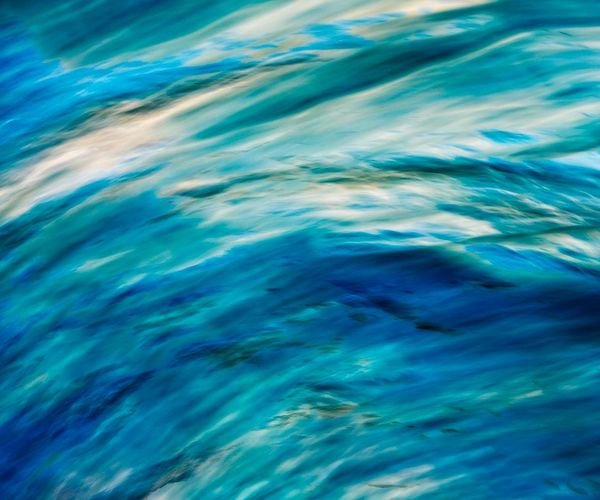 Abstract visual of calm breathing waves or energy flow.